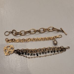 Three Gold-Tone Bracelets
